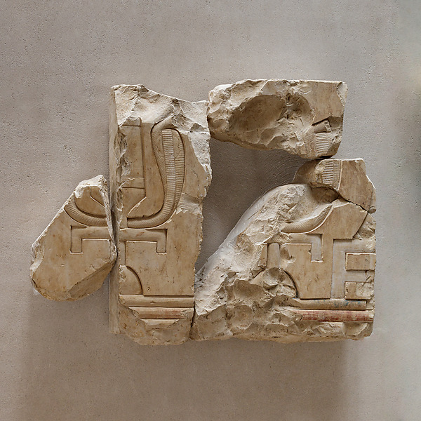 Relief fragments of two sacred emblems