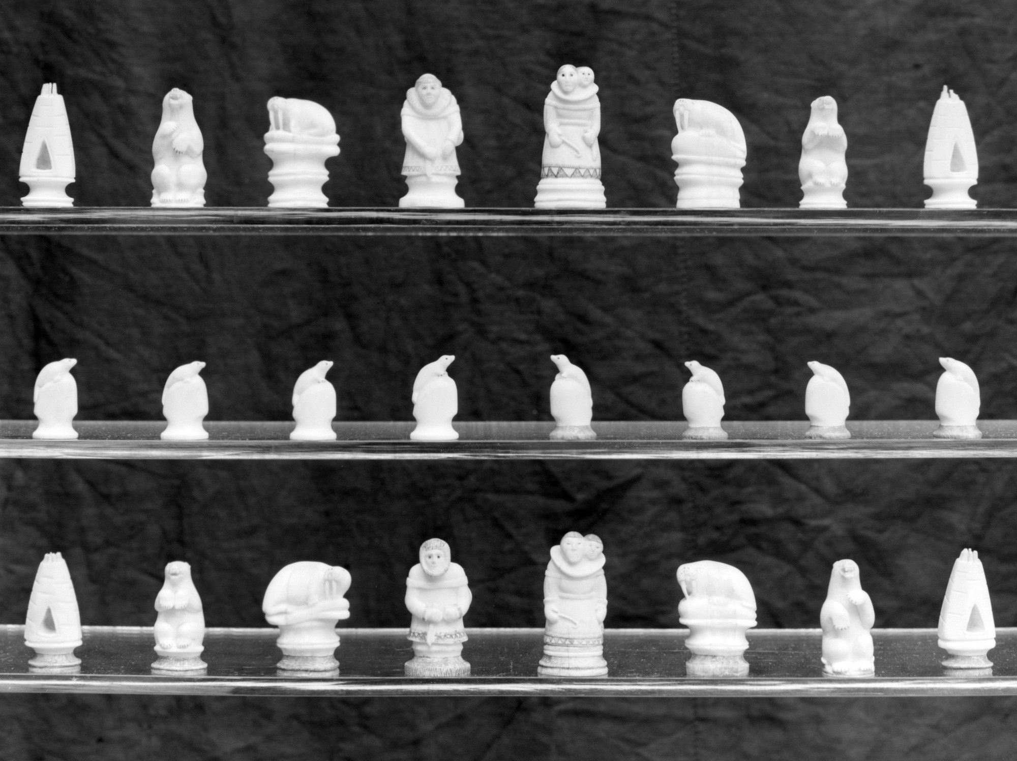 Bonhams : An Inuit sperm whale tooth chess set, Canada, circa 1920