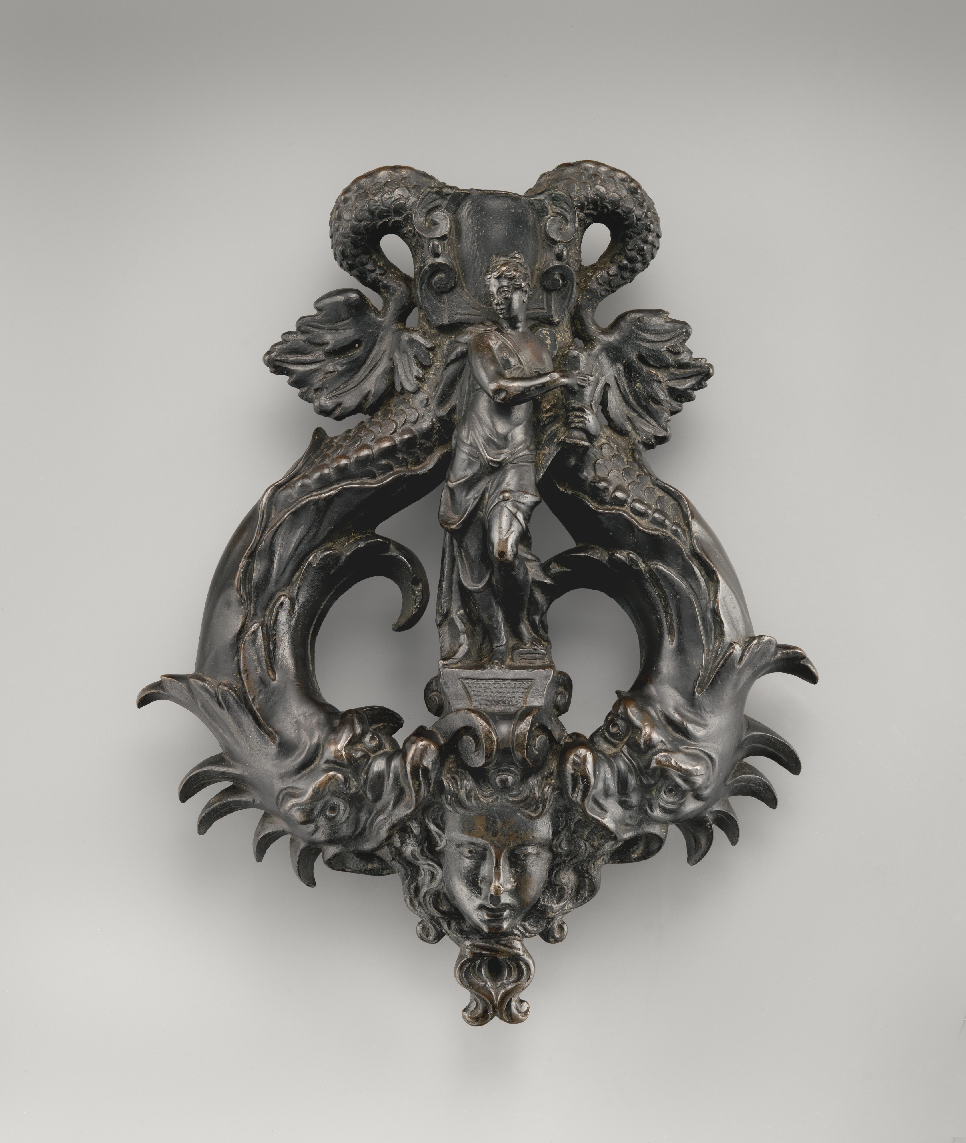Door Boss: Bust of a Satyress. Italian (Northern). Date: 1575-1585.  Dimensions: 6 3/4 x 5 5/8 x 4 in. Bronze. Origin: Northern Italy. - Album  alb4134510