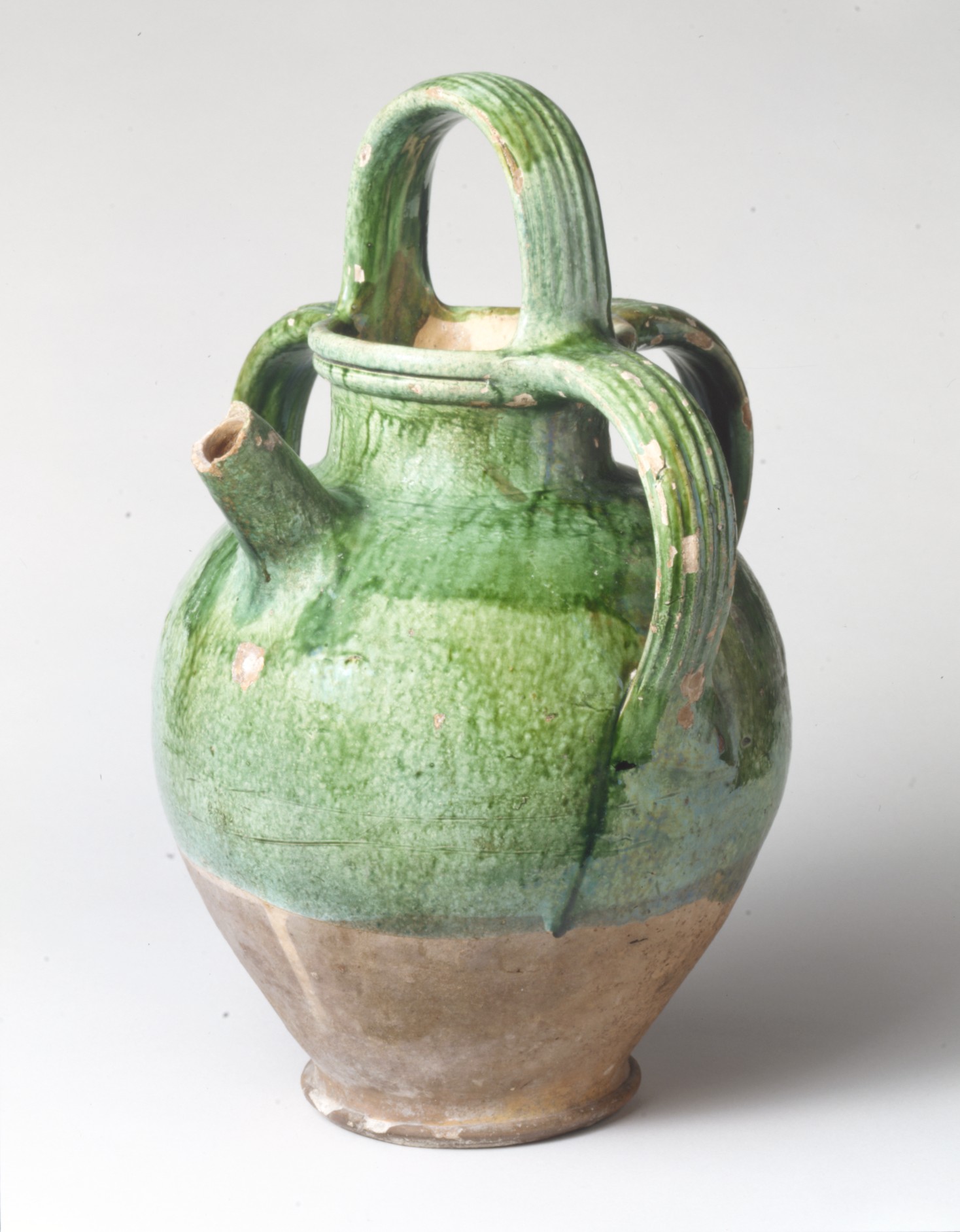 clay pitcher pouring water