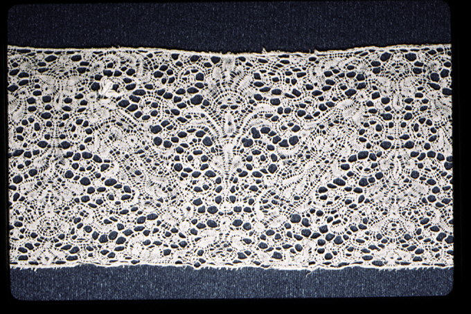 Pair of lappets and joined cap edging