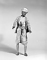 King's attendant, Giovanbattista Polidoro (Italian), Polychromed terracotta head and wooden limbs; body of wire wrapped in tow; silk garments with silver and gold metallic thread; silk and cotton turban; metal dagger in leather sheath, Italian, Naples