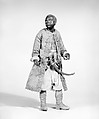 King's Moorish attendant, Polychromed terracotta head and wooden limbs; body of wire wrapped in tow; cotton and silk garments with silver and gold metallic thread; brass sword, Italian, Naples