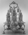 Warwick cruet stand with three casters and two bottles, Robert Peaston British, Silver, British, London