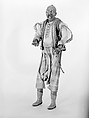 King's attendant, Polychromed terracotta head; wooden limbs; body of wire wrapped in tow; silk garments with silver and gold thread and buttons; gilt-metal sword, Italian, Naples