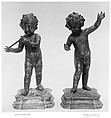 Nude child playing a flute (one of a pair), Wood, carved and painted, French