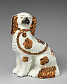 Pair of spaniels, Lead-glazed earthenware with copper lustre embellishments, British, Staffordshire