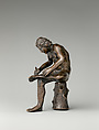 Spinario (boy pulling a thorn from his foot), Workshop of Severo Calzetta da Ravenna (Italian, active by 1496, died before 1543), Bronze on green marble base, Italian, Padua or Ravenna