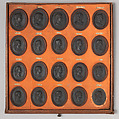 Cabinet of 140 plaques, Basalt ware, British, Staffordshire