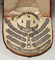 Fifteen-piece parure in leather case, Cut steel; red moroccan leather, gilt stamped, French