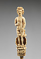 Paper knife with carved handle of nude with sun in hair standing in a half shell holding a swag, Steel gilt, ivory, Italian