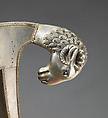 Side chair with rams' heads (one of a pair), White alloy metal sheets (silvered?) over wooden core, probaly teak; silk and metallic woven textile, Anglo-Indian