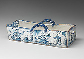 Model of a cradle, Tin-glazed earthenware, British