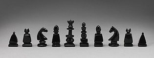 Chessmen (32) and board, Imitation amber, jet, British