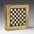 Chess and tric-trac board, Copper-gilt, walnut, ivory, mother-of-pearl, serpentine, rosso antico marble, Spanish, Castile