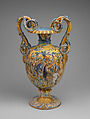 A pair of monumental vases with scenes from 