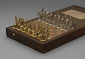 Chess set and box-board, Base metal, silvered, and silver-gilt, Indian or Turkish chessmen with probably German bases