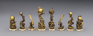 Left to right: 48.174.92a–h Astronomical chess set, Max Esser (German, Barth 1885–1945 Berlin), Silver, silver-gilt, ivory, ebony, marble, plaster, brass, beeswax, enamel, German, Berlin