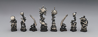 L to R: 48.174.92aa–hh Astronomical chess set, Max Esser (German, Barth 1885–1945 Berlin), Silver, silver-gilt, ivory, ebony, marble, plaster, brass, beeswax, enamel, German, Berlin