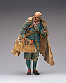 Poultry vendor with leather cap and two chickens in netted basket, Polychromed terracotta head and wooden limbs; body of wire wrapped in tow; cotton and leather garments or accessories; wicker basket with mixed media, Italian, Naples
