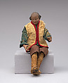 Man in beige vest with red trim, blue shirt, knee-length brown trousers, Polychromed terracotta head and wooden limbs; body of wire wrapped in tow; cotton garments