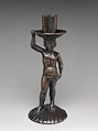 Boy on a shell, holding a candlestick, Bronze, partially oil-gilt, Italian, possibly Rome