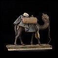 Camel, Polychromed wooden body covered with stucco; wooden saddle and leather girth straps; burlap cushion and leather saddlebags, Italian, Naples