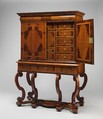 Cabinet on stand, Pine veneered with marquetry of walnut, burl walnut, holly; oak drawers; walnut legs; brass hardware, some of it replaced, British