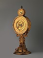 Mirror clock, Movement attributed to Master CR (probably active before 1565), Case: gilded brass and gilded copper; Dial: gilded brass; Movement: plated frame of iron, iron wheels, German, Nuremberg