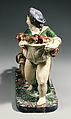 Boy carrying pups, Lead-glazed earthenware, French, Fontainebleau