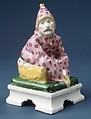Figure of a seated Chinese man, Nymphenburg Porcelain Manufactory German, Hard-paste porcelain, German, Nymphenburg