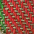 Fragment from an apron (opreg cu ciucuri), Background: twill weave (warp: Turcana wool, Z spun, 24 per cm; weft: metal-wrapped thread; wool, Z spun, 14 per cm; cotton, 2Z spun, S plied); decorative panel: tapestry weave (warp: cotton, 2Z spun, S pliz, 16 per cm; weft: linen, Z spun, 38 per cm; silk, 2Z spun, S plied; metal-wrapped thread, 64 per cm); embroidery: metal-wrapped thread, metal coil, Romanian, Banat area