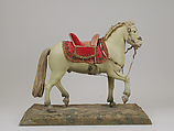 Horse, Polychromed terracotta body; wooden legs and tail; velvet covered wooden saddle; satin saddle blanket bordered with metallic thread; gold neck strap and gold threaded girth with gilt metal buckles; silver braided martingale; gold braided mane; silver braided bridle; silver stirrups and silver braided reins, Italian, Naples