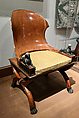 Sphinx Chair, Mahogany, with painted simulated marble panels, lacquered brass mouldings, mounted with bronze sphinxes and paw feet, French