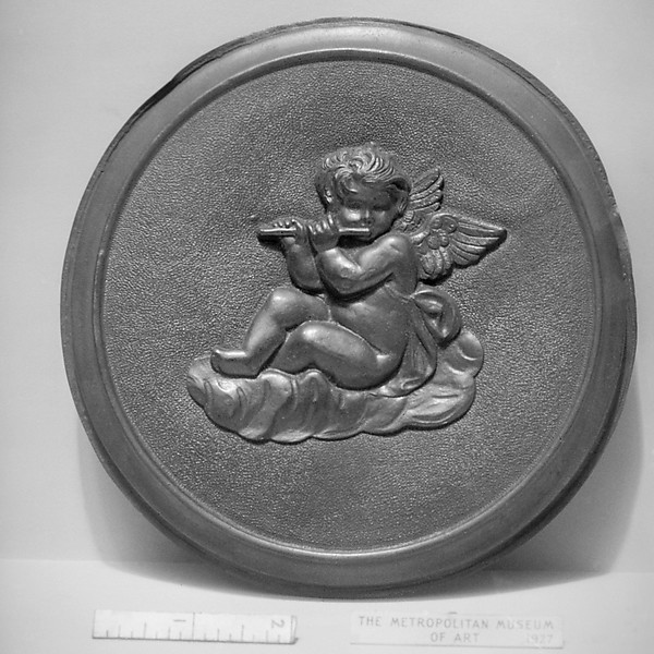 Cupid playing flute