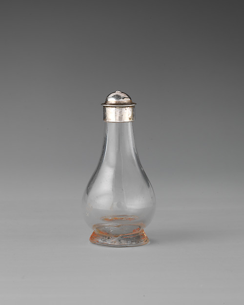 Miniature bottle with cover