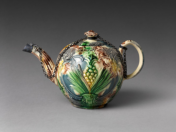 Teapot with relief decoration