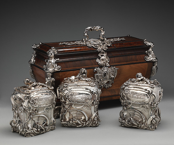 Pair of tea caddies and a sugar box in a case