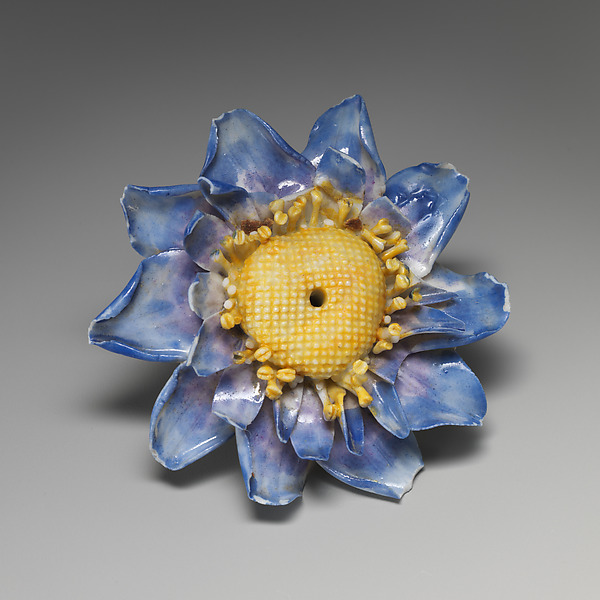 Porcelain flower (one of a set of nine)