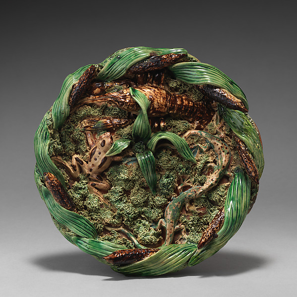 Round dish with cattail border by Emile Gambut
