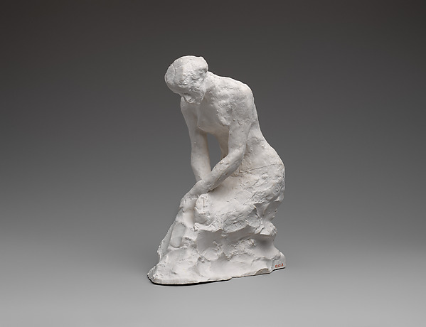 Young woman kneeling