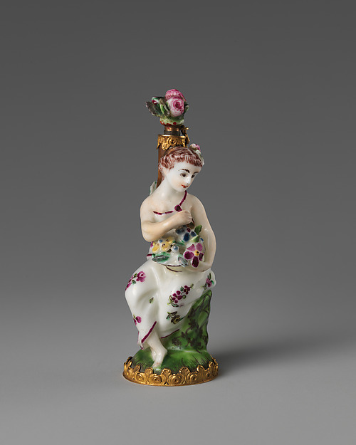 Girl with a basket of flowers
