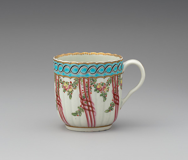 Four coffee cups (part of a service)