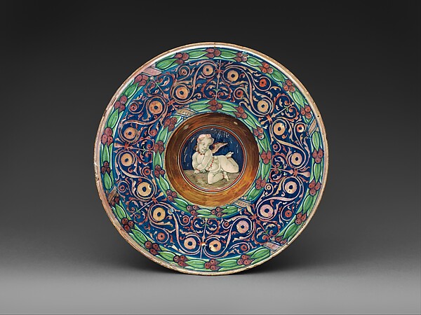 Wide-rimmed bowl with winged putto