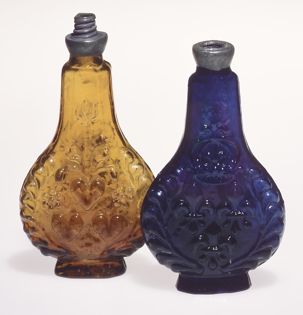 Amber-colored flacon de poche decorated with fleur de lys and hearts by Glasshouse of Bernard Perrot, Verrerie Royale d'Orléans, The Metropolitan Museum of Art
