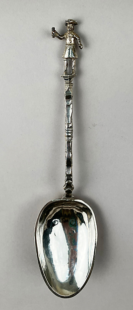 Figure-top spoon