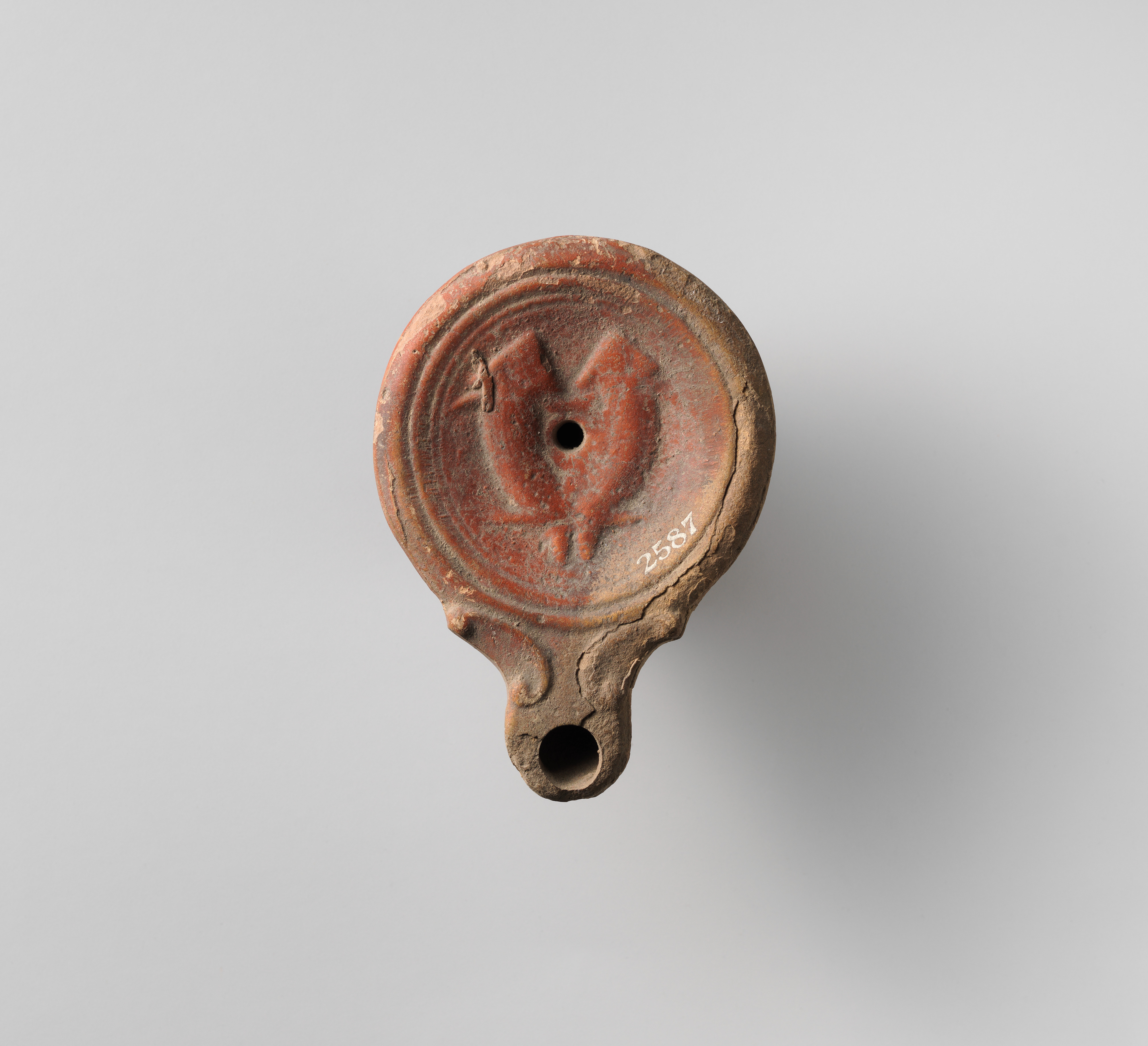 Terrocotta oil lamp