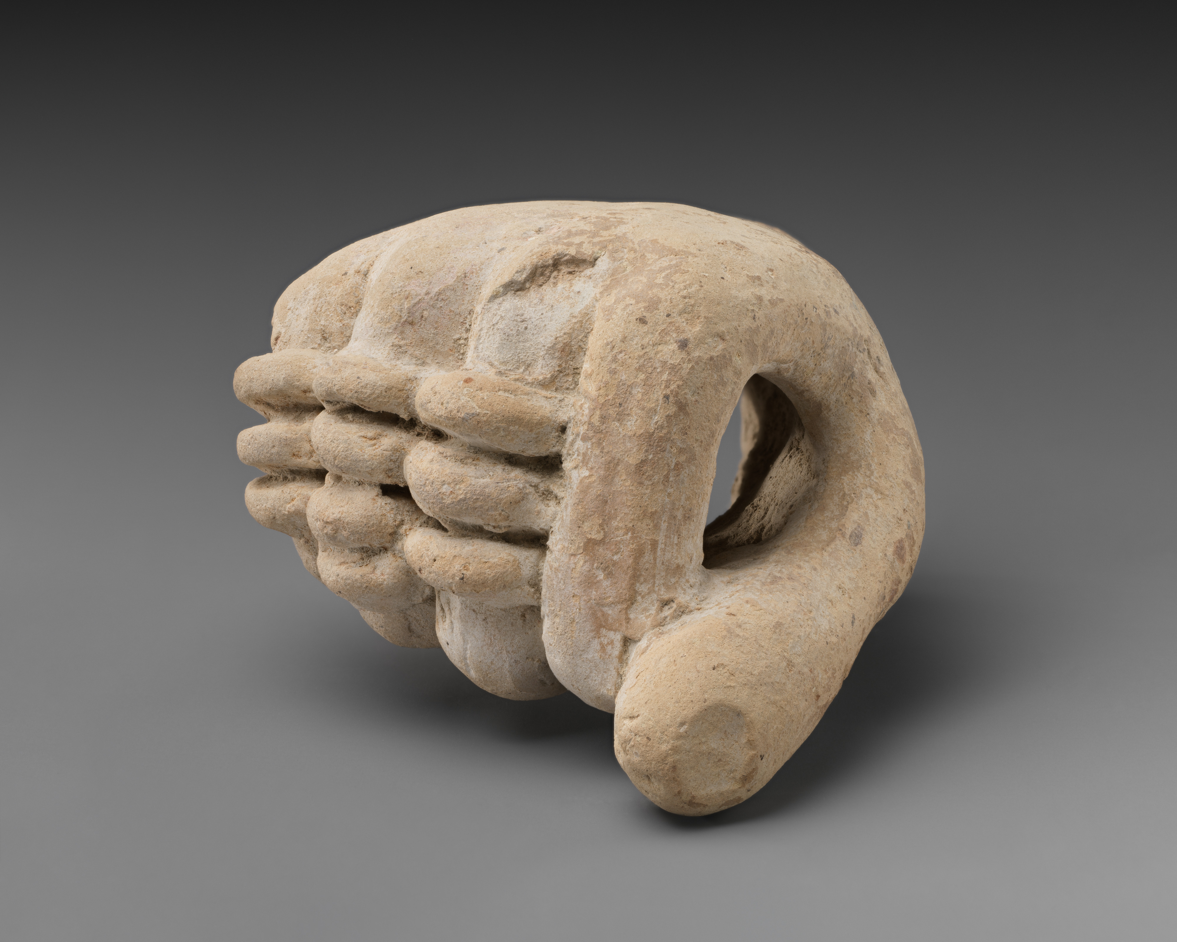 Terracotta fragment of a hand