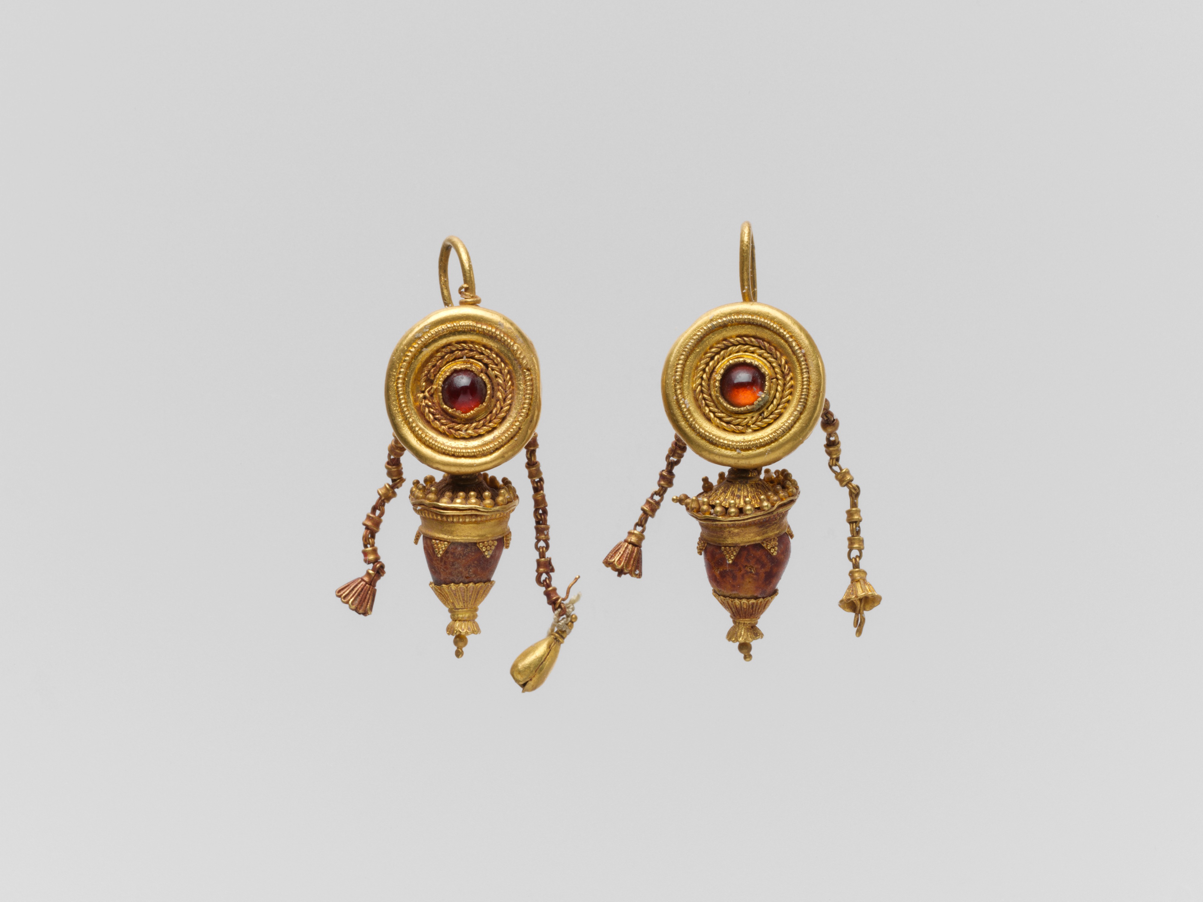 Pair of gold, garnet, and glass paste disk and pendant earrings | Greek ...