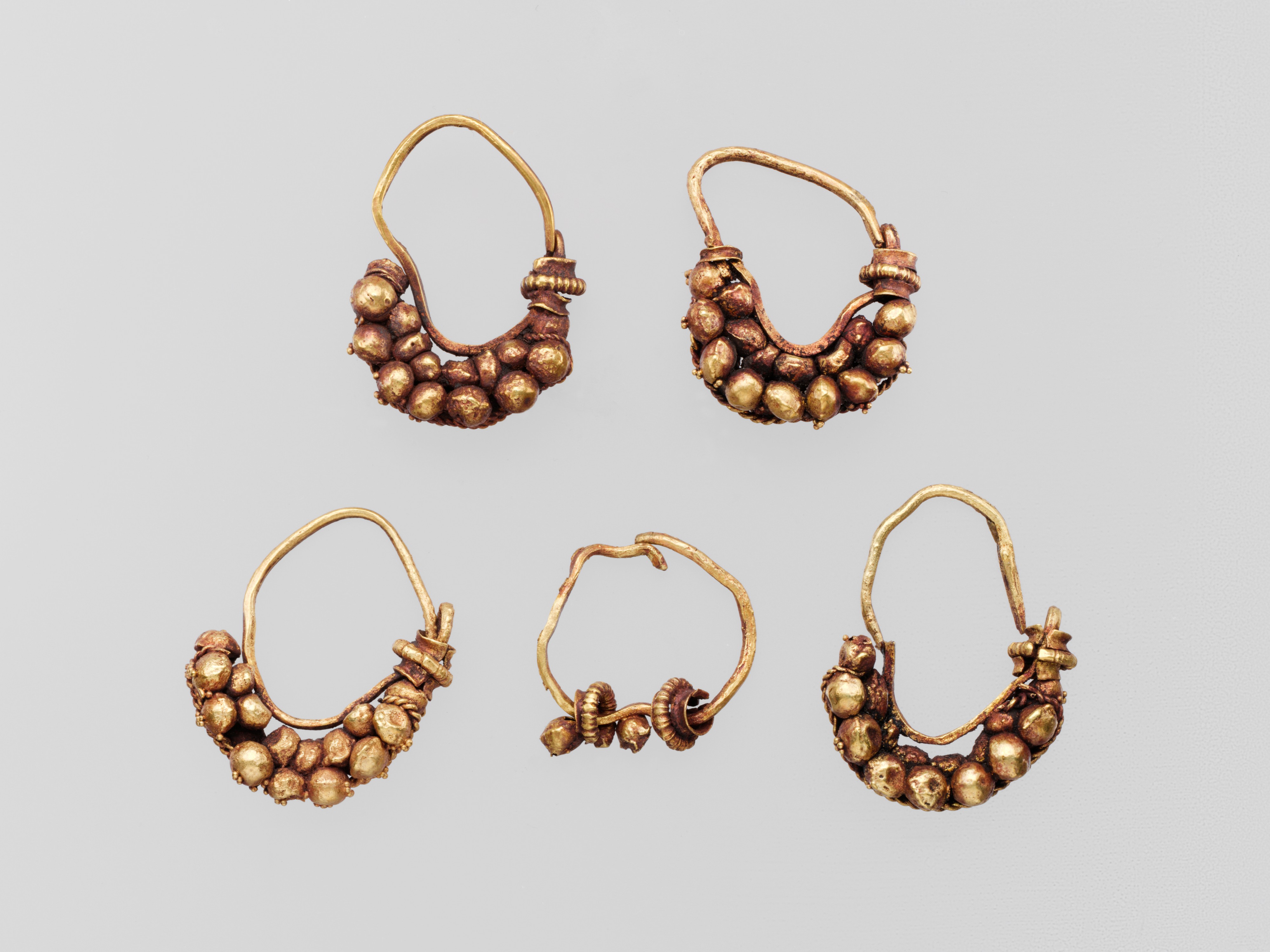 Five gold earrings with spherical elements | Roman | Late Republic or ...